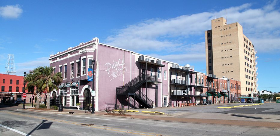 056019 RGB W Buildings Along Pujo Street At Ryan Street Lake Charles Louisiana USA 27 December 2020 